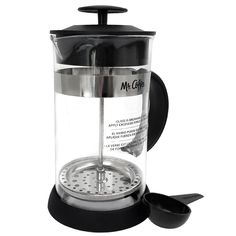 a french press coffee maker with the lid open