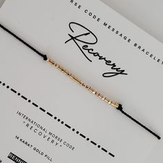 What better way to let someone special know how proud you are of their  "RECOVERY"  than in a secret Morse code message bracelet they can keep close to them on their wrist.   🖤 Dainty and subtle, "RECOVERY"  is spelled out in Morse code alphabet using  high quality .925 Sterling silver, 14 karat gold fill, rose gold, and 14 karat solid gold beads. 🖤 Band is made from Durable, High Quality 100% Silk Cord in your choice of color. 🖤 End beads and closure bead are coordinating sterling silver or Morse Alphabet, Code Alphabet, Secret Message Bracelet, Coded Message, Message Bracelet, Morse Code Bracelet, Hidden Message, Morse Code, Secret Messages