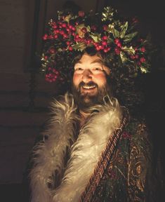 a man with a wreath on his head