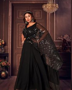 Trendy indowestern  crop top lehanga set.  This unique dress comes with attached style drape in metallic and satin material.  Fabric: Georgette and imported satin Color : black  Size :40 Draped Sharara For Party, Semi-stitched Party Wear Pre-draped Saree, Party Sharara With Unstitched Blouse, Traditional Party Wear Saree, Party Pre-draped Saree With Mirror Work, Party Wear Saree For Evening Navratri, Party Wear Saree For Evening Navratri Festival, Glamorous Party Lehenga For Navratri, Party Sets With Draped Sleeves And Traditional Drape