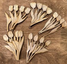 several pieces of wood carved to look like flowers