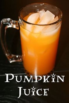 pumpkin juice in a glass mug with ice cubes on the rim and text that reads pumpkin juice