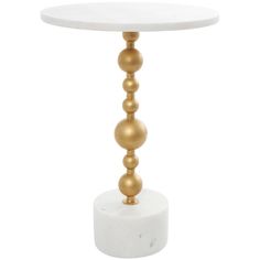 a white and gold table with three balls on the top, sitting in front of a white background