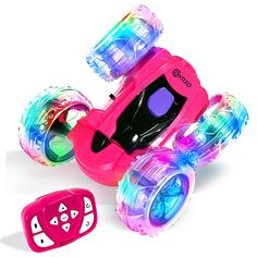 a pink toy car with lights and wheels