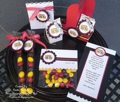 a table with candy and cards on it