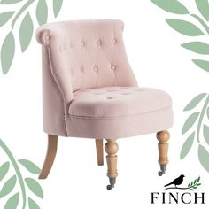 an upholstered pink chair with wooden legs and tufted back rests on a white background surrounded by green leaves