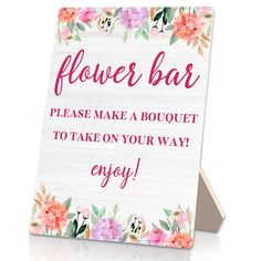 a sign that says flower bar please make a bouquet to take on your way enjoy