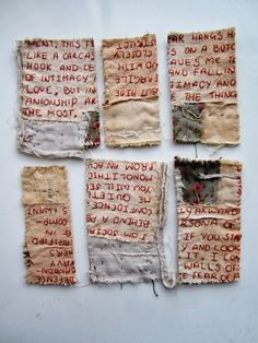 four pieces of torn paper with words on them and some type of writing in the middle