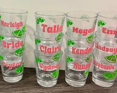 several glasses with names and limes on them