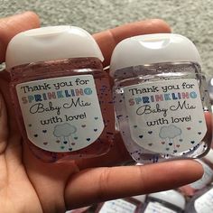 two baby shower bottles with thank you for drinking