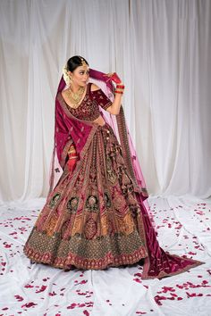 This Lehenga Choli is Ready to Wear A stunning lehenga with beautiful Heavy Sequins, diamond and Zari work, dupatta and lehenga, designed especially for wedding season. Type : Bridal Lehenga Choli Style : A-Line Occasion: Festival Wear, occasion Wear, Party wear Festival: Diwali, Navratri, Pongal, Ugadi etc. Color: Lehenga – Rani Color, Blouse – Rani Color, Dupatta – Rani & Maroon Color Fabric : Lehenga – Velvet, Blouse – Velvet, Dupatta – Net & Velvet. Work: Lehenga – Sequins, diamond and Zari Rani Color Lehenga Bridal, Lahnga Choli Design Beautiful, Reception Lehenga Bridal, Lehenga Sequins, Lehenga Velvet, Choli Style, Diwali Dress, Velvet Lehenga Choli, Velvet Dupatta