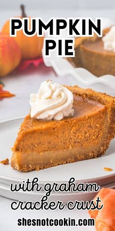 a slice of pumpkin pie with graham cracker crust on a white plate next to an orange pumpkin