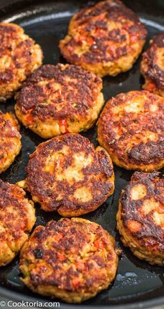 some food is cooking in a pan on top of the stove burner and ready to be cooked