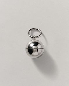 Inspired by moments of joy and surprise. Its elegant spherical design conceals a hidden interior of reflection, Carry it anywhere with its convenient keychain feature. Keychain Multitool, Mirror Keychain, Chrome Accessories, Luxury Gifts For Men, Mystical Jewelry, Silver Keychain, Unique Keychains, Metal Keychain, Ring Size Guide