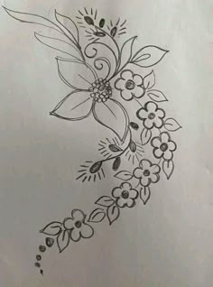 a drawing of flowers and leaves is shown in black ink on a piece of paper