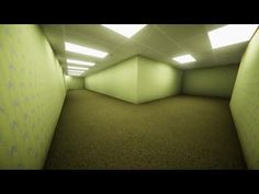 an empty room with green walls and carpet