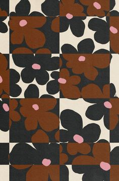 a black and white flower pattern with pink dots