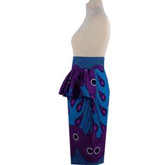 This Ankara Peplum Pencil Skirt features a classic African print entrance and flared peplum waistline. Its pencil silhouette adds a tailored yet chic look that will flatter any body type. Perfect for any occasion, this skirt is sure to be a stunning addition to your wardrobe. Product Features Please Compare your Measurements To our Size Chart Before Purchase Fully Lined Fitted waist Center back seam with invisible zipper Regular fit- true to size Skirt Length is 30 Inches from Waist Hand Wash wi Poncho Blouse, Ankara Print, African Ankara, Bedding Accessories, Mud Cloth, Bottom Clothes, Waxed Cotton, Chic Look, Mild Soap