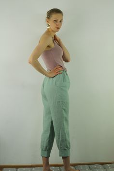 "Write the selected color in the message Women linen pants with 2 pockets in minty green color, perfect for casual wear and suitable for any occasion in any season Details: - 100% natural linen produced in Europe ; - medium weight (180 gram per square meter); - color: grayish blue, can be any from our colors catalogue (color samples at the photo); Made to order, approximately a few days, If you have any questions please message me and I will be glad to answer. Size guide : Size XS Bust: fits bus Green Tapered Leg Sweatpants With Elastic Waistband, Green Straight Leg Loungewear Bottoms, Green Relaxed Fit Pants For Loungewear, Green Straight Leg Bottoms For Loungewear, Green Bottoms For Loungewear With Loosely Fitted Hips, Casual Green High-waisted Pants, Casual High-waisted Green Pants, Green High-waisted Pants With Pockets, Green Wide Leg Ankle-length Pants For Loungewear