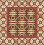 a red and green quilt with an intricate design