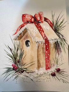 a watercolor painting of a birdhouse with a red bow