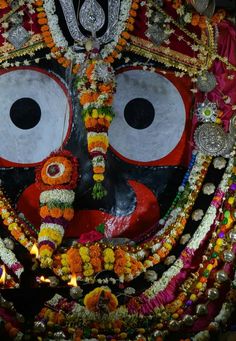 an elaborately decorated mask is displayed on display