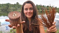 a woman is holding two wickers in her hands