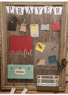 a wooden frame with magnets and paper on it that says,'prayer grateful '