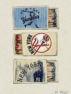 three matchesticks with the new york yankees and new york yankees logos on them