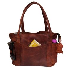 PRICES MAY VARY. Material: GENUINE LEATHER. Durable and soft fabric lining, with double stitching. Brown color shade gives it a vintage look. Hand polish with oil gives it unique brown shade to each bag. Dimensions: Length: 16" (40 CM) x Width: 5" (12.5 CM) x Height: 11" (27.5 CM) with a top handle, shoulder handle drop is 8" (20 cm) approx. |INSIDE BAG| The main compartment easily sorts your stuff & make your travel a fun filled experience with this bag, 2 slot pockets and 1 zipper pocket Easil Ipad Laptop, Casual Purse, Work Handbag, Handmade Purse, Everyday Purse, Laptop Shoulder Bag, Genuine Leather Totes, Personal Belongings, Brown Tote