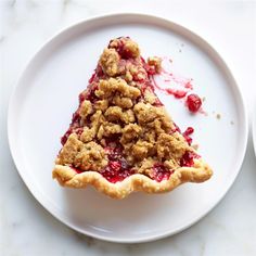 a piece of pie on a white plate