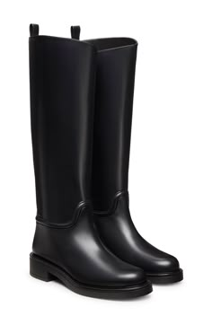 Masterfully crafted in Spain from supple calf leather, this riding boot is a surefire favorite for achieving classic cool-weather looks. 15 1/2" shaft; 14 1/2" calf circumference Pull-on style Leather upper and lining/synthetic sole Made in Spain Xmas 2024, Black Leather Riding Boots, Spring Wardrobe Essentials, Stuart Weitzman Boots, Womens Riding Boots, Black Riding Boots, Curated Closet, Walker Shoes, Riding Boot