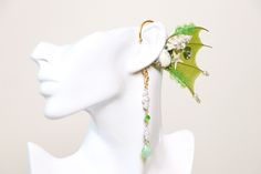 Elven Ear Cuffs - This is a way to look and feel like a Fairy or an Elf! No need for piercing your ears or gluing those latex fake ears on to your skin! 【Please do not use force to bend the earing】Slowly and gently try to slip on the ear. If excessive force is use it can break. *Color is mixed every time an earring is being made. Color might not be exactly as the photo but will try my best to replicate the same exact color Emerald Green color Fin, Shell, Gold mental Bend Cuffs to resize The pend Handmade Fantasy Style Jewelry For Parties, Handmade Fantasy Jewelry For Party, Handmade Fantasy Body Jewelry For Party, Adjustable Fairycore Jewelry For Parties, Fairycore Jewelry For Parties, Adjustable Fantasy Style Party Ear Cuff, Fantasy Costume Jewelry For Halloween, Whimsical Handmade Jewelry For Cosplay, Fantasy Halloween Costume Jewelry