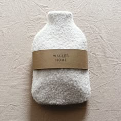 Hand crafted from the plushest boucle wool. Our hot water bottle has a fluffy feel and soft texture. Comes complete with a rubber hot water bottle, Designed to keep you warm and cosy but also make the perfect stylish gift Cover 100% polyester boucle wool  standard size - approx. 39cm x 22cm  Approx. Depth: 4.3cm - 10cm. Our hot water bottles comply with BS 1970:2012 standards. Safety information is included with the product. Please contact us for more information. Hot Water Bottle Instructions Directions of use: Do not use boiling water when filling the hot water bottle. Fill to maximum 2/3 capacity. Hold the bottle by the neck in an upright position and fill slowly to avoid hot water splashing back. Expel air from the bottle by lowering it carefully onto a flat surface until water appears Warm Water Bottle, Hot Water Bottles, Hot Water Bottle Cover, Envelope Design, Hot Water Bottle, Cool Ideas, Heat Pack, Beauty Spa, Stylish Gifts