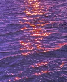 the sun shines brightly on the water as it is reflected in the ocean waves