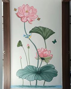 a painting on the side of a wall with pink flowers and butterflies flying over it