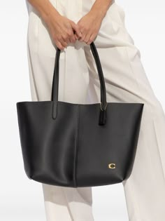 Coach North 32 Leather Tote Bag - Farfetch Coach Tote Bag Outfit, Uni Tote Bag, Tote Bag Outfit, Branded Tote Bags, Coach Tote Bag, Luxury Tote Bags, Coach Tote Bags, Black Leather Tote Bag, Office Bag