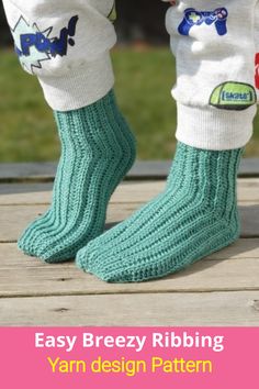 the legs and feet of a child wearing socks with words easy breezy ribbing yarn design