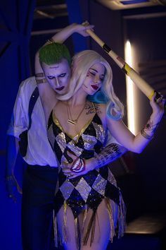 two people dressed up in costumes and makeup