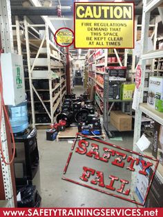 there is a sign that says safety fail in the middle of a store filled with items