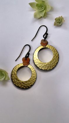 Hammered Hoop Shape Earrings.  I sell only vintage jewelry and I use my pictures as part of the description. As with most vintage items there may be wear consistent with the age.  Find more unique vintage earrings and jewelry in my store at AllieAnneCo.etsy.com Thank you for stopping by! 😊 https://www.etsy.com/shop/AllieAnneCo Retro Brass Drop Earrings, Retro Brass Jewelry With Matching Earrings, Handmade Vintage Brass Clip-on Earrings, Vintage Handmade Brass Clip-on Earrings, Handmade Retro Gold Clip-on Earrings, Vintage Single Clip-on Earring In Metal, Handmade Gold Retro Clip-on Earrings, Handmade Metal Retro Earrings, Handmade Retro Metal Earrings