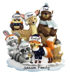 a family christmas ornament with animals on it