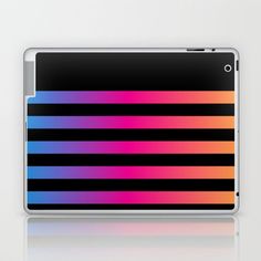 an image of a laptop with colorful lines on the back and sides, all in different colors