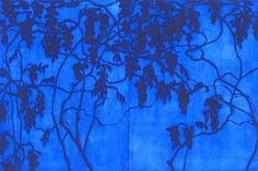 a blue painting with leaves and branches against a blue background that looks like it has been painted