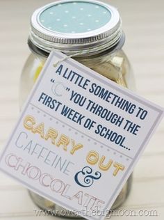 there is a jar with some candy in it and a sign that says, a little something to you through the first week of school