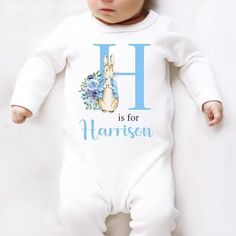 Make bedtime extra special with this personalized blue sleepsuit for your baby boy. The name printing adds a unique touch! 💙 #babynamesleepsuit #personalisedbaby #newbornoutfit #babyboyclothing #adorablebaby #EtsyUK #HoolarooUK