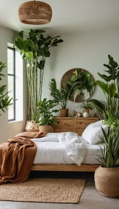 a bedroom with lots of plants in the corner