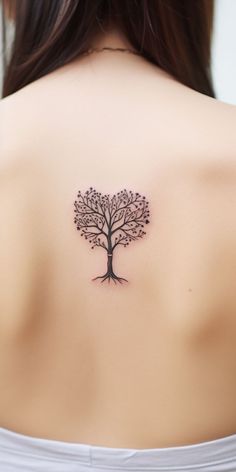 Aesthetic, heart-shaped tree back tattoo with a minimalistic design, encapsulating the sentiments of love and the resilience of nature. A perfect selection for those looking for a unique, nature-inspired back tattoo. Tree Heart Tattoo, Tree Back Tattoo, Tree Tattoo Back, Tree Heart, Latest Tattoos, Face Tattoos, Plant A Tree, Anatomical Heart, Heart Tree