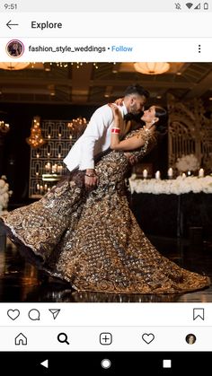 a man and woman dance together on the dance floor in front of chandeliers