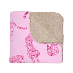 a pink blanket with leopards on it